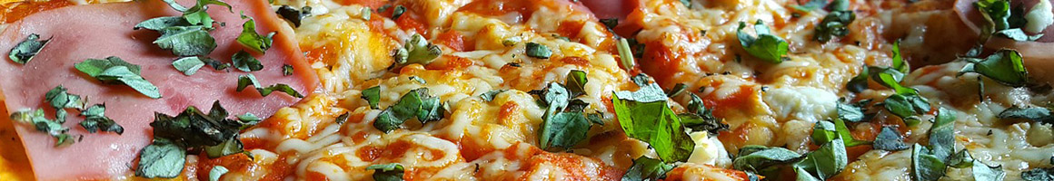 Eating Pizza at Rhombus Guys restaurant in Grand Forks, ND.